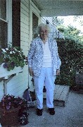 Julia (Judy) Kish Dorrough on front porch